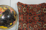 Antique Herati Bijar rug fragment pillow detail: rich red pattern, seafoam linen side.