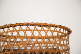 Delicate, intricate hand-woven pattern and wrapped upper rim of a vintage Japanese basket.