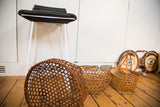Angled view showing the vintage Japanese basket's delicate, hand-woven hexagonal pattern.