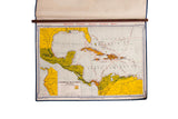Vintage 1967 Denoyer Geppert map, Caribbean settlement with exploration routes, on walnut rod.