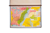 Vintage Denoyer Geppert map displaying colorful US states, walnut rod, 44x32 inches.