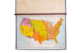 Vintage Denoyer Geppert map showing US territorial acquisitions with colorful regions, mounted on walnut rod.