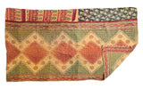 Vibrant hand-stitched Kantha Quilt featuring beige, red, green geometric and floral patterns.