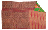 Hand-stitched vintage Indian Kantha quilt, double-sided with muted floral and vibrant green patterns.