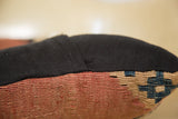 Antique Kilim Pillow side: black linen back meets faded red and blue early 20th century kilim.