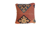 Antique Kilim Pillow with time-softened terracotta, blue, and beige geometric motifs, 12x12 inch.