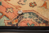 Metal magnetic snap closure on the woven vintage rug fragment clutch flap.