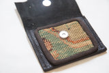 Hand-woven green, brown, orange rug fragment with magnetic snap inside coin purse.