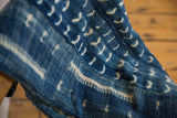 Detail of Batik Indigo Throw revealing hand-woven texture and intricate white patterns.
