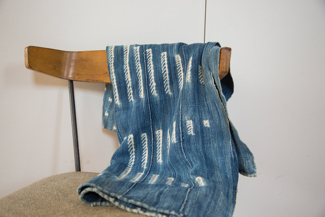 Hand-woven Batik Indigo Throw, intricate white patterns on deep blue textile, 46