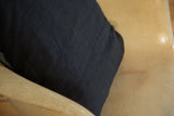 Black European linen back featuring envelope enclosure stitching.