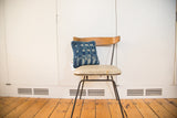 Vintage African Indigo handmade pillow featuring sun-faded textile and unique patterns, 12x12 inches.