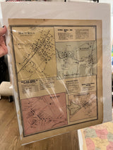 Antique 1860s directory with aged, torn edges and discolored paper, held in a protective sleeve.
