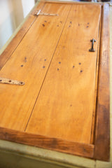 Reclaimed wood top with metal hinges and latch on the industrial factory cart.