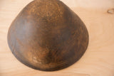 Vintage African bowl, dark hand-carved wood with rich patina and subtle lines.