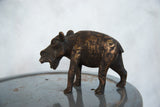 Expressive vintage African hippo sculpture with detailed copper patina and open mouth.