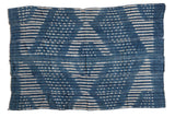Collectible vintage African indigo textile throw with hand-dyed cream geometric patterns.