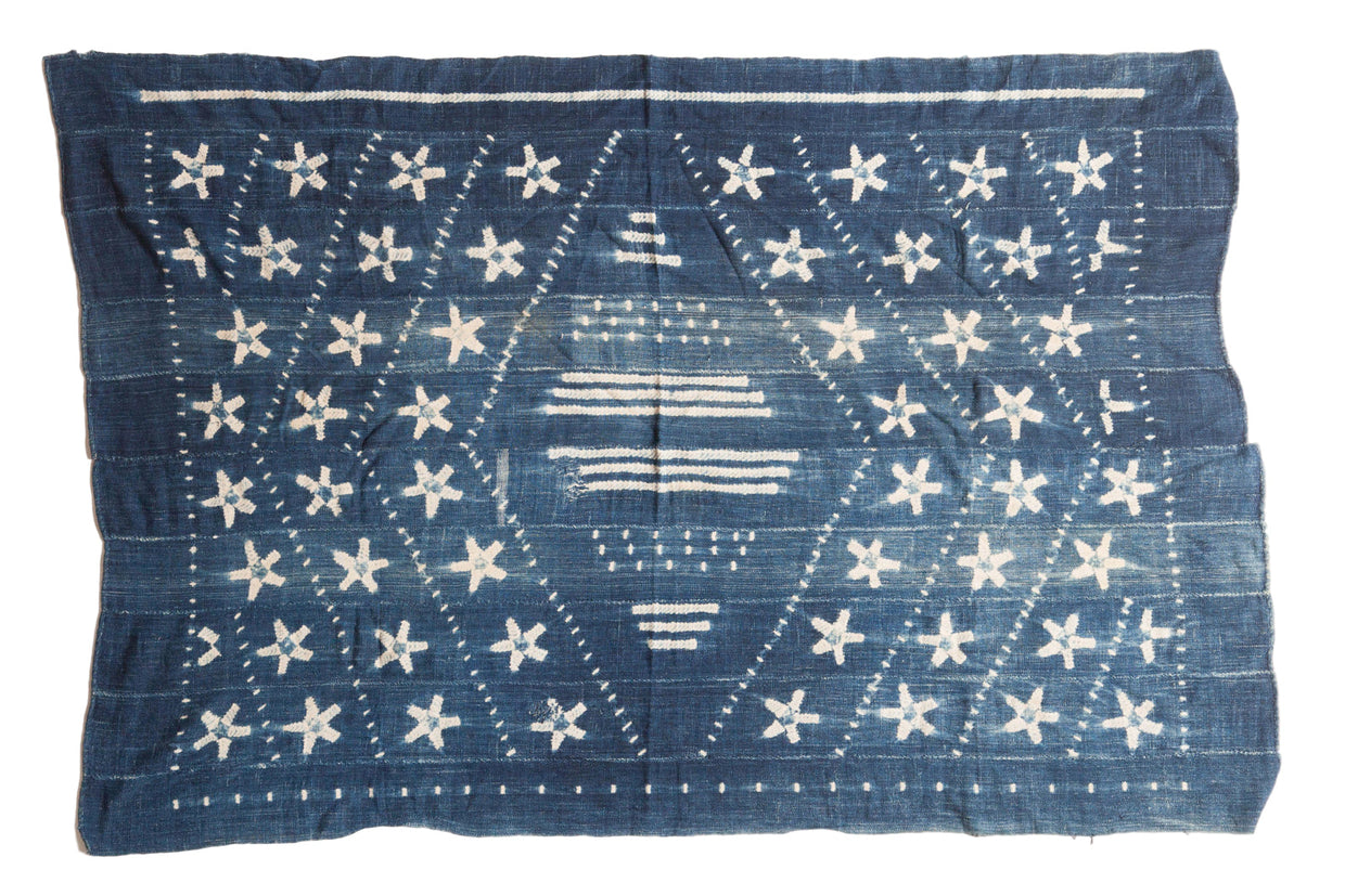 Hand woven Batik indigo African textile throw with off-white geometric star patterns, 3'7