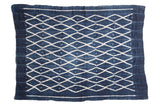 Collectible vintage African Indigo Textile Throw featuring a blue and off-white geometric diamond pattern.