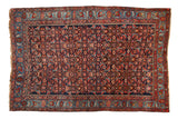 Collector grade Antique Bijar rug with an allover Herati design, indigo field, and complex sky blue floral border.