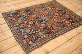 Angled view of a vintage Tabriz rug showcasing its oversized Herati motif and clear drawing.