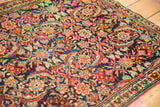 Detailed texture of the finely woven wool pile on a collector-quality Tabriz Sennehbaft.