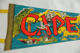 Vintage Cape Cod felt pennant showing red 'APE' letters, map outline, sailboat, and windmill.
