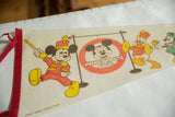 Vintage Mickey Mouse Club felt pennant, Mickey in red band uniform, visible creasing.