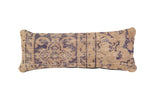 Handmade reclaimed Turkish rug fragment lumbar pillow with faded violet and natural beige pattern.