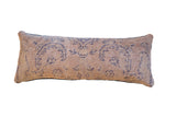 Vintage Turkish rug fragment skinny lumbar pillow, faded beige and muted navy abstract pattern, 10x26 inches.