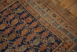 The original plain-weave kilim end and border detail of a hand-knotted antique Afshar rug.