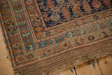 Detail of an antique Afshar corner showing the original plain-weave kilim and mostly even wear.