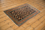 A collector's antique Persian Serapi rug showing its fine allover Herati design and nuanced colors.