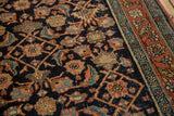 Fine weave and even wear visible on the Herati motif of a Collector antique Serapi rug.