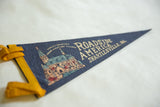 Vintage Shartlesville PA felt pennant detail, dark blue with yellow trim and village graphic.