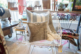 Distressed vintage Oushak pillow, light gray with faded purple-pink and mint green geometric pattern.