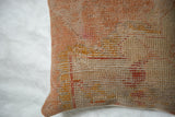 Vintage Turkish Rug Fragment Pillow showing textured weave, wear, and muted peach-beige colors.