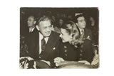 Vintage candid photograph of actress Ingrid Bergman with producer David Selznick in a theater.