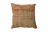 Vintage Turkish Rug Fragment Throw Pillow with geometric patterns in muted orange and beige, 18x18 inches.