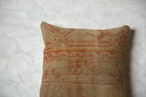 Vintage Turkish Rug Fragment Throw Pillow showcasing woven texture and distressed geometric patterns.