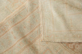 The hand-knotted reverse of a vintage Oushak carpet, showing the intact side cord and short wool pile.