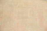 Close-up of even wear to knot heads and faint foundation on a distressed Oushak rug.