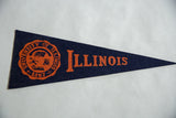 Crisp orange crest and lettering on the navy blue felt of a vintage Illinois pennant.