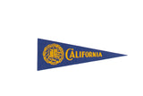 Vintage University of California felt flag featuring royal blue and yellow school colors and crest.
