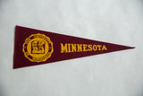 Gold school crest and lettering on a vintage maroon University of Minnesota felt pennant.