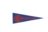 Vintage blue felt Pennsylvania University pennant with red school crest and lettering.