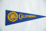 Vintage University of California blue felt pennant with yellow seal detail.