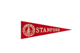 Vintage 1950s red felt Stanford University pennant with white crest and block text.