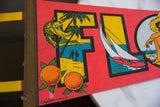 Vintage Florida felt pennant detail, showing yellow alligator, palm trees, and oranges.