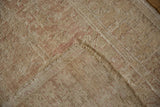 Hand-knotted foundation and exposed knot heads on a distressed vintage Turkish Melas rug.
